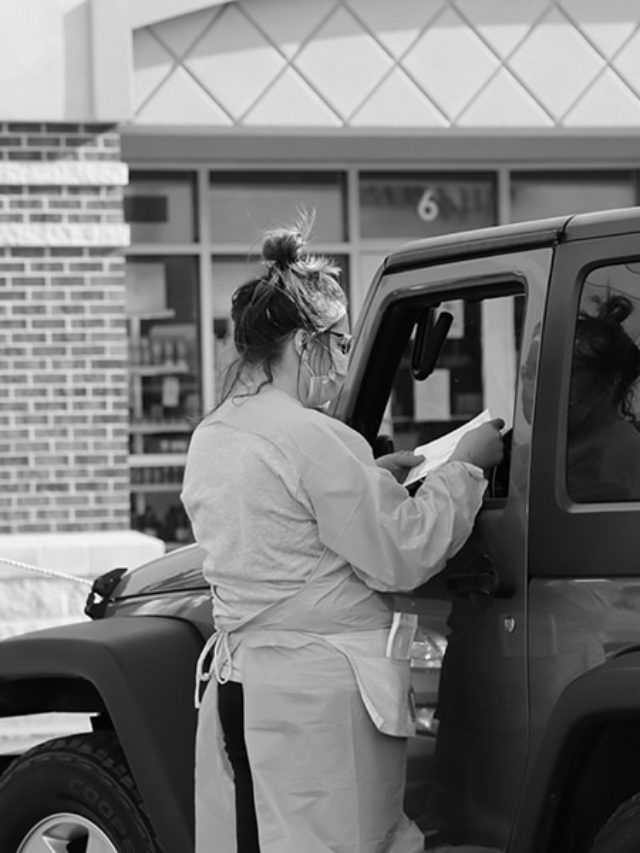 IMAGE: Women giving a covid test in lenexa