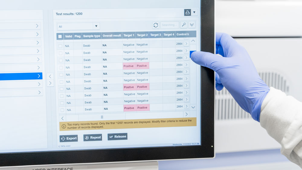 Medical professional examining COVID results